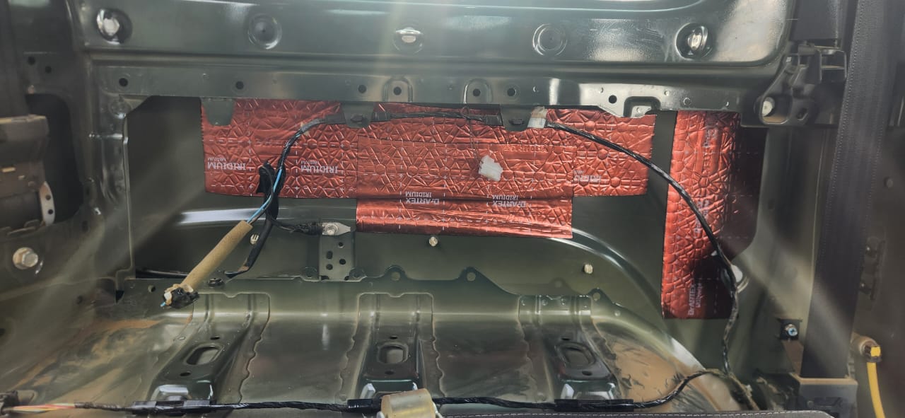 Suzuki Jimny rear panel with sound-deadening before speaker bracket fitment